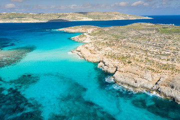 Fototapeta na wymiar Aerial drone photo - The famous Blue Lagoon in the Mediterranean Sea. Comino Island, Malta.