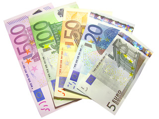 Different euro bills isolated in white