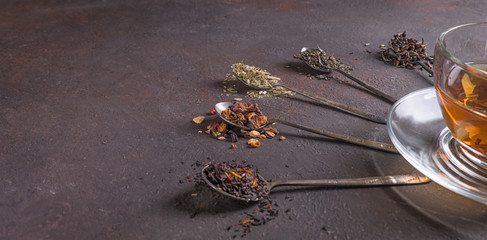 Different black and green dry tea. Space for text.Fruit tea.