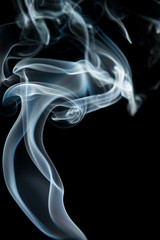 White smoke on black background