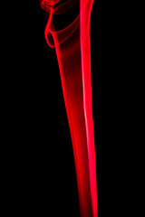 Red smoke on black background