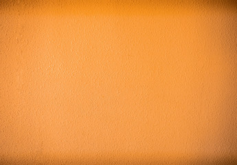 Abstract rough wall orange color background. Good wall wallpaper.