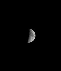 Beautiful halfmoon phase, with the pitch black dark sky.