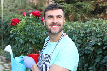 Cute man working on his garden 