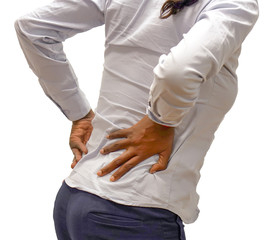African woman with pain in kidneys isolated on a white background. African girl with backache clasping her hand to her lower back.