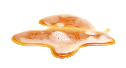 Spilled beer puddle with foam isolated on white background and texture, side view