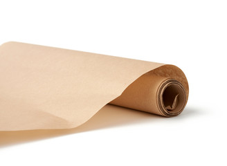 twisted roll of brown parchment paper isolated on a white background