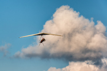 Hang glider wing with small engine.