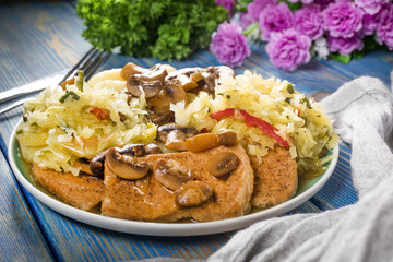 Braised pork loin with mushrooms.