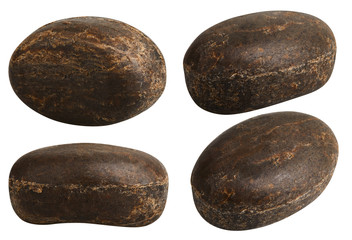 Bar of African black soap with Shea Butter for Skin Care isolated on white background. This Soap Bar is Made with Pure Natural Ingredients for  Cleansing, Nourishing, Protecting