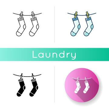 Outside drying icon. Laundry, clothesline, outdoors clothes drying. Socks hanging on clothesline, clean clothing, washed garment. Linear black and RGB color styles. Isolated vector illustrations