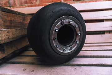 homemade metal disk with a go-kart tire