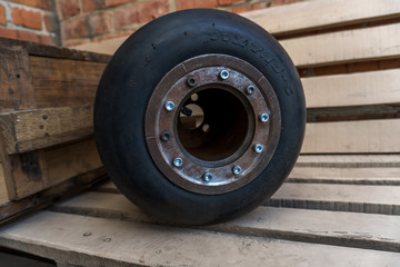 homemade metal disk with a go-kart tire