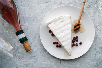 Brie cheese. Food for wine and romance, cheese delicacies. Horizontal menu design. View from above....