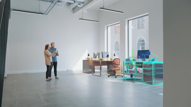 In Empty New Office: Female Interior Designer and Male Office Architect Talk, Use Augmented Reality Software on Digital Tablet Computer to Choose, Move and Manipulate 3D Furniture. VFX Render
