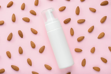 Gel with almond extract concept. Top above overhead view photo of bottle with place for label and...