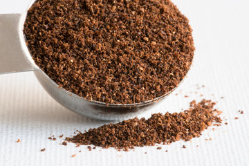 Ground Cloves Spilled from a Teaspoon