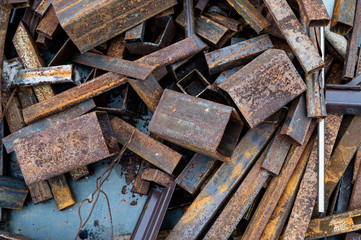 Above view of rusty scrap metal pieces