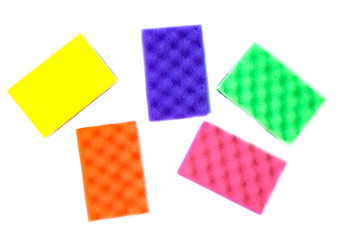 multi-colored sponges on a white background, isolate.