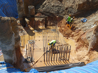 Pile cap and column stump under construction at the construction site. Constructed using reinforced...