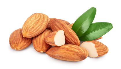 Almonds nuts with leaves isolated on white background with clipping path and full depth of field.