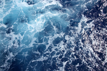 Fototapeta na wymiar The ocean with swell & ripples of foam on the top, Atlantic.