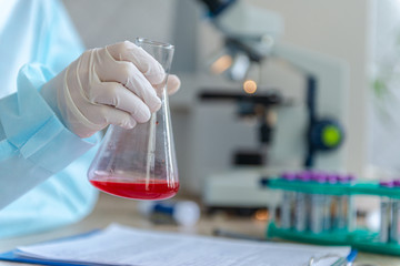 A doctor is looking for a coronavirus vaccine in his laboratory.