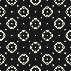 Vector geometric texture. Black & white ornamental seamless pattern. Abstract monochrome background with carved shapes, squares, mosaic elements. Repeat design for decor, fabric, tiling, cloth, covers