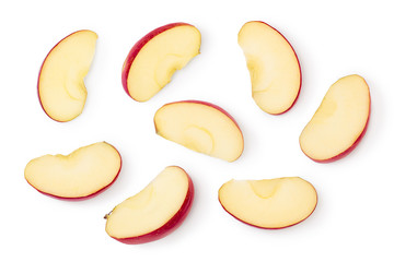 Red apple slices isolated on white background with clipping path and full depth of field. Top view....