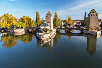 Fototapeta premium Covered Bridges and historical district in evening Autumn light, Strasbourg, France