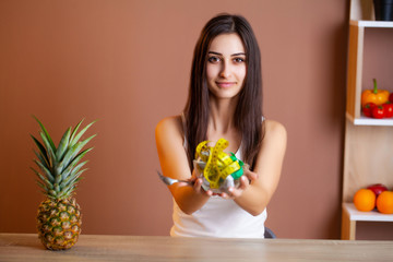 Woman on a diet holding a plate full of tape