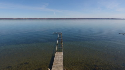 Aerial view of dock on lake in spring