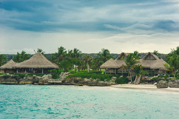 Fototapeta premium Water bungalows on a tropical island - travel background