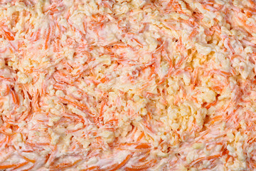 Salad of fresh grated carrots, cheese, garlic and mayonnaise. Texture