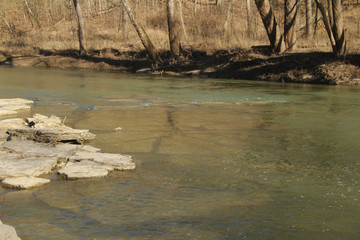 Clear Water Showing the Cracked Rock Below