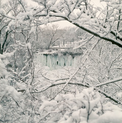 Frozen Minnehaha Falls surrounded by hoarfrost. Minneapolis Minnesota MN USA