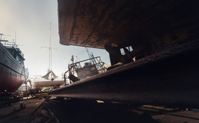 Fishing boats in local shipyard for maintenance.