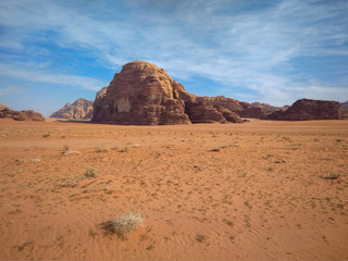 Fototapeta na wymiar rock formations and desert landscape of Wadi Rum desert in southern Jordan. Popular tourist destination.