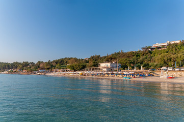 Fototapeta na wymiar Kallithea, Greece - September 03,2019: Kalithea Beach (Greek: Παραλία Καλλιθέα) the most beautiful beach in Kallithea, Halkidiki in Greece.