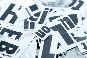 Scattered Cutout Newspaper Fonts Background