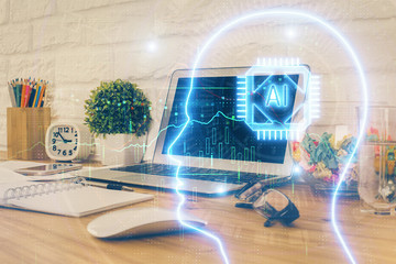 Double exposure of work space with computer and human brain drawing hologram. Brainstorm concept.