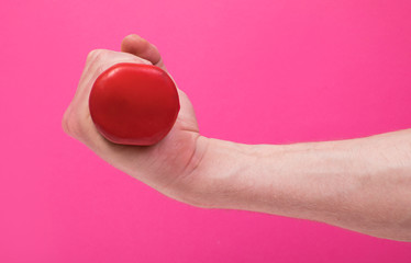 Hand with dumbbells.