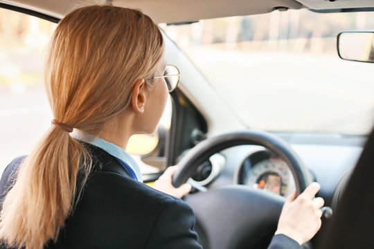 Beautiful Woman Driving Taxi Car