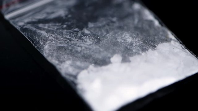 Cocaine on a dark plate (seamless loopable)
