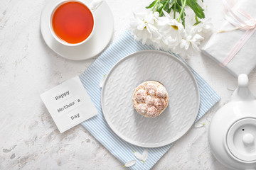 Tasty breakfast for mother on white background