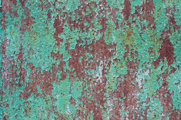 Rusty metal texture. Metal sheet with rust and worn green paint. Metal background