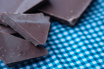 Close up of dark chocolate on table cloths 