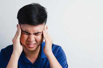 Man are head ace with torture face in grey background. Healthy, Office syndrome, disease, illness,...