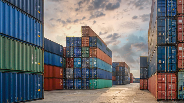 perspective view of containers at containers yard with forklift and truck