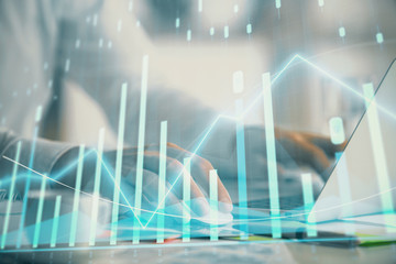 Naklejka premium Double exposure of forex graph with man working on computer on background. Concept of market analysis.